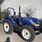 Tractor de granja agrícola de cuatro ruedas con el tractor de Front End Loader And Digger